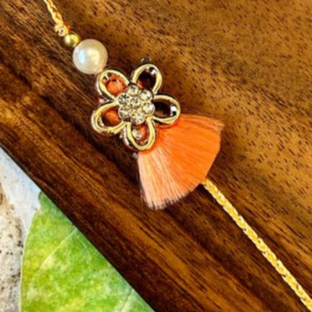 Golden Flower with Tassel Rakhi (Peach) - Single