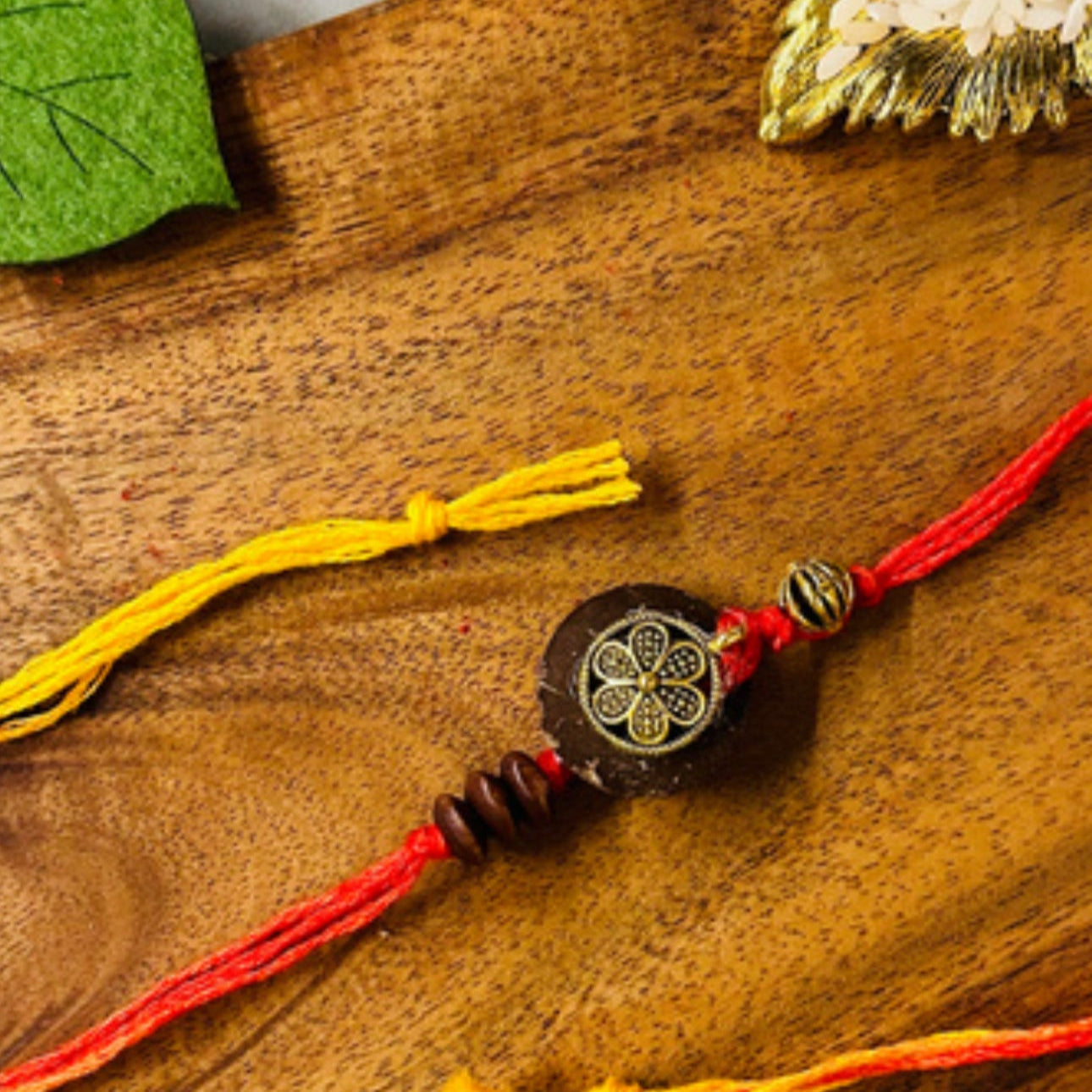 Coconut Shell & Golden Flower Rakhi - Single