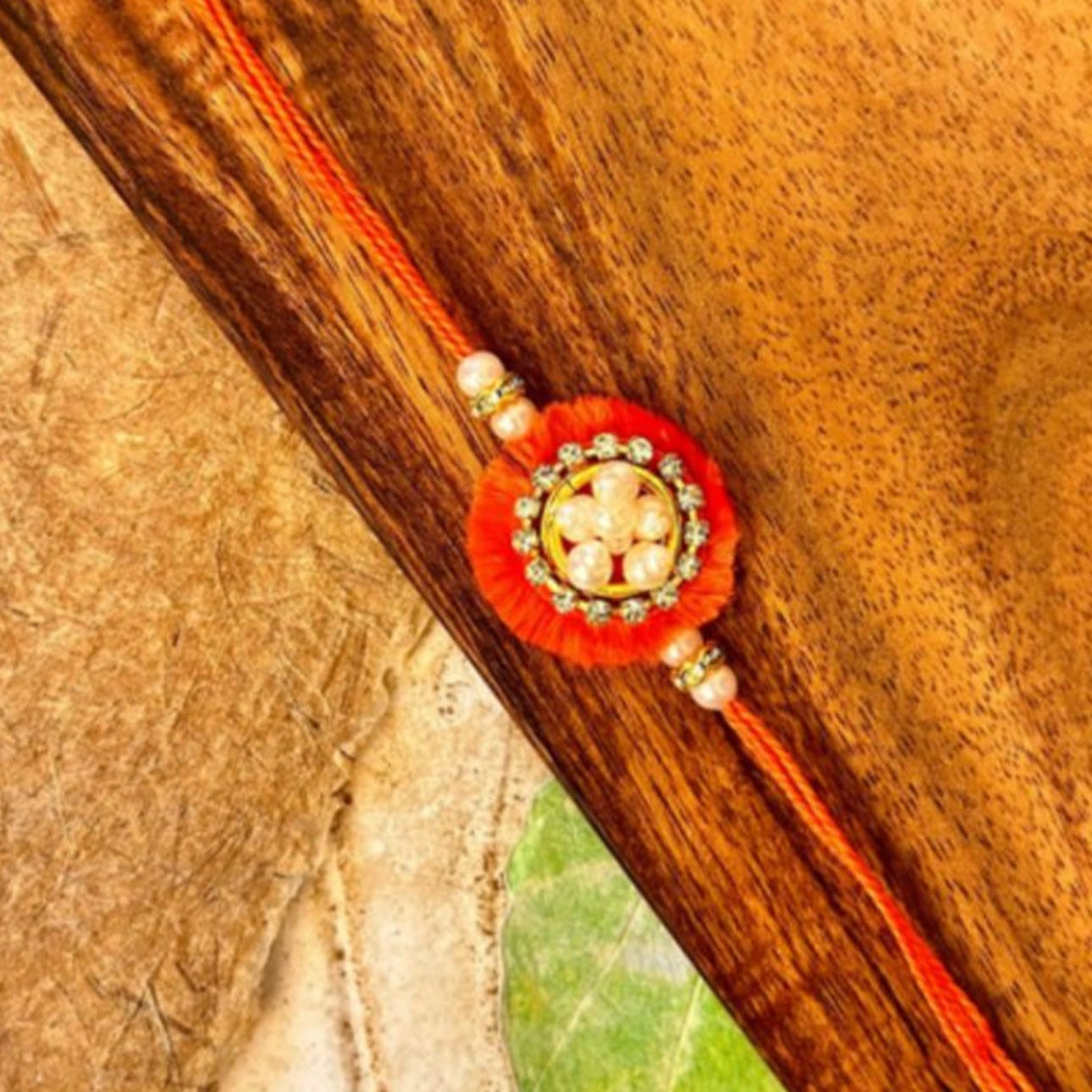 3D Moti & Stone Orange Rakhi - Single