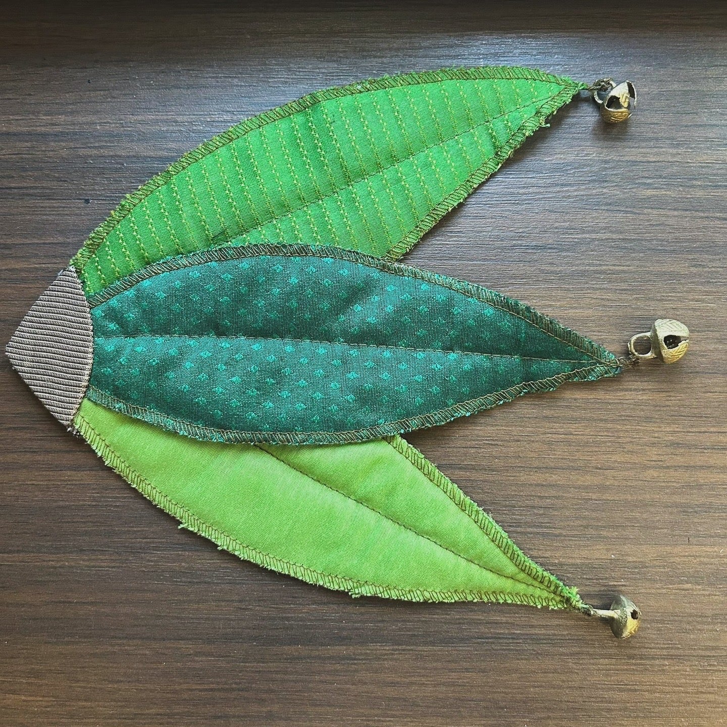 Elegant 3 Green Leaf Brocade Fabric Placemats with Bells Accents - Perfect for Festive Decor