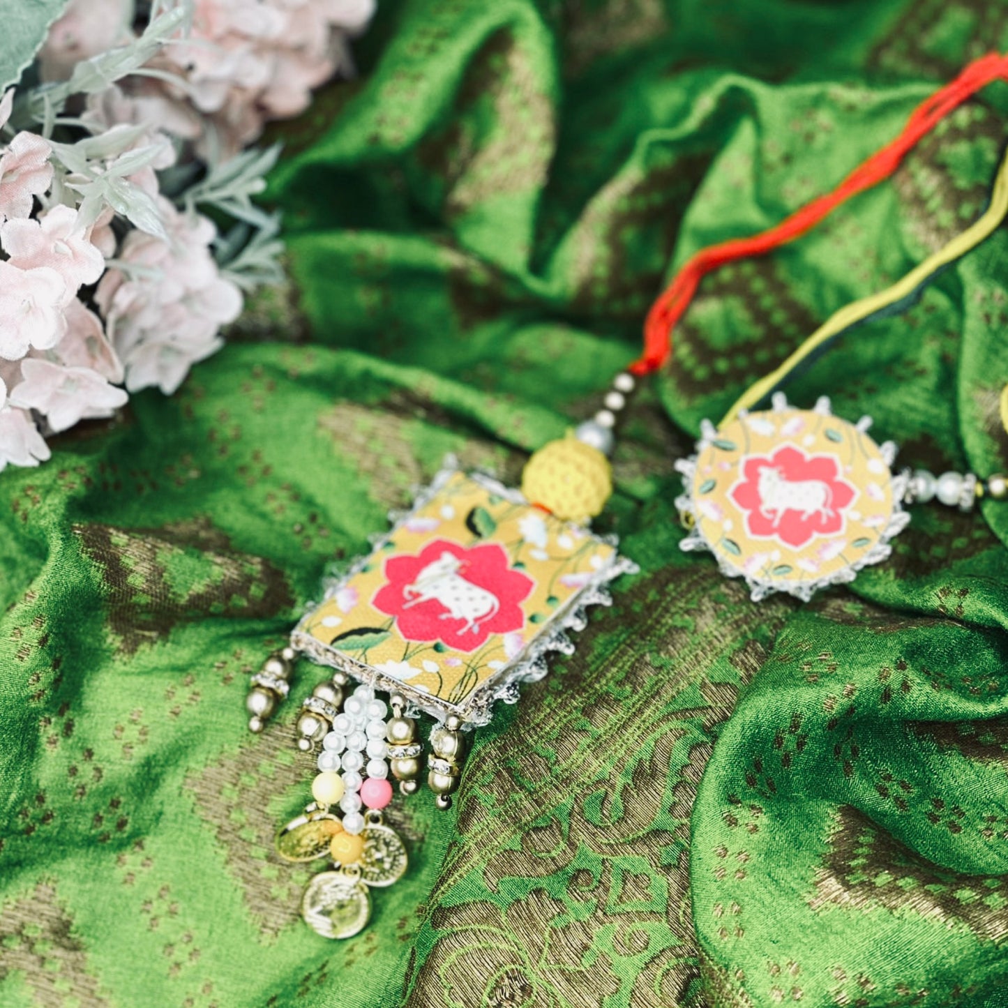 Yellow Pichwai Rakhi Set