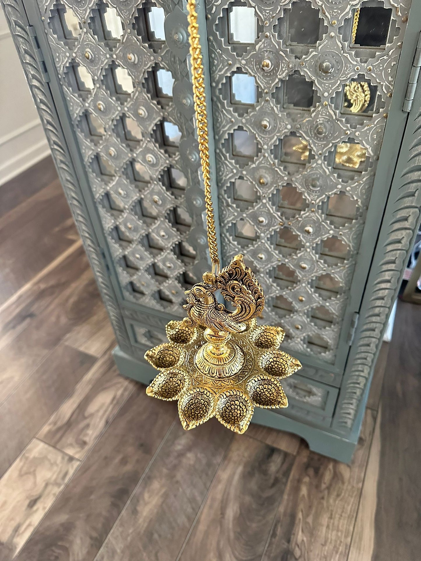 Red & Gold Potli β Packed with Metal Gold Oxide Mor Diya Hanging | Ready to Gift