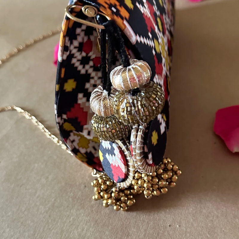 Patola Clutch with Versatile Options - Elegant Tassel and Removable Metal String for Convenience