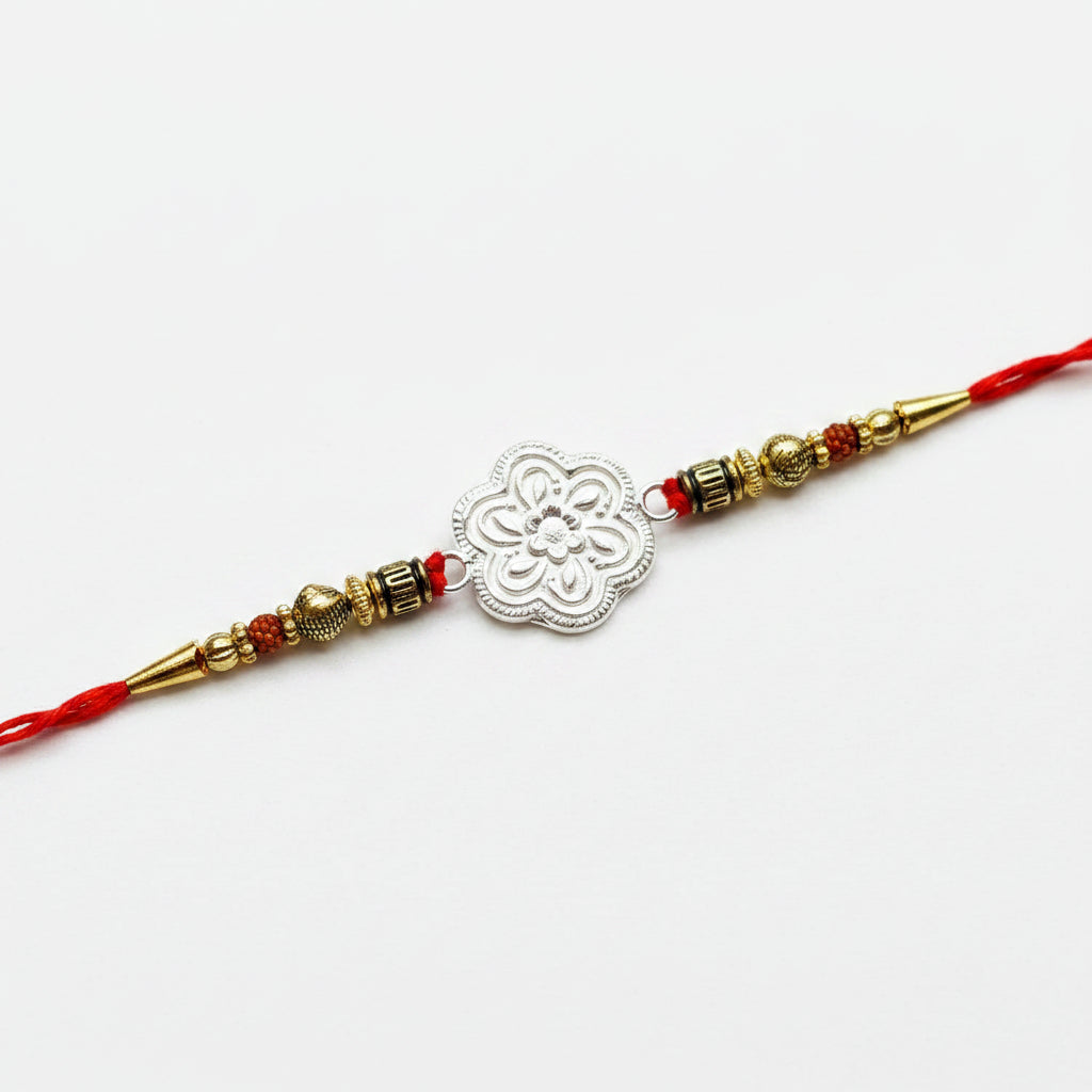 Fine Silver Floral Crest Rakhi with Rudraksha Beads