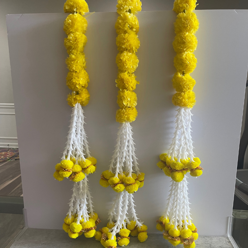Festive 5ft Marigold Garland. adorned with flowets and pom-poms