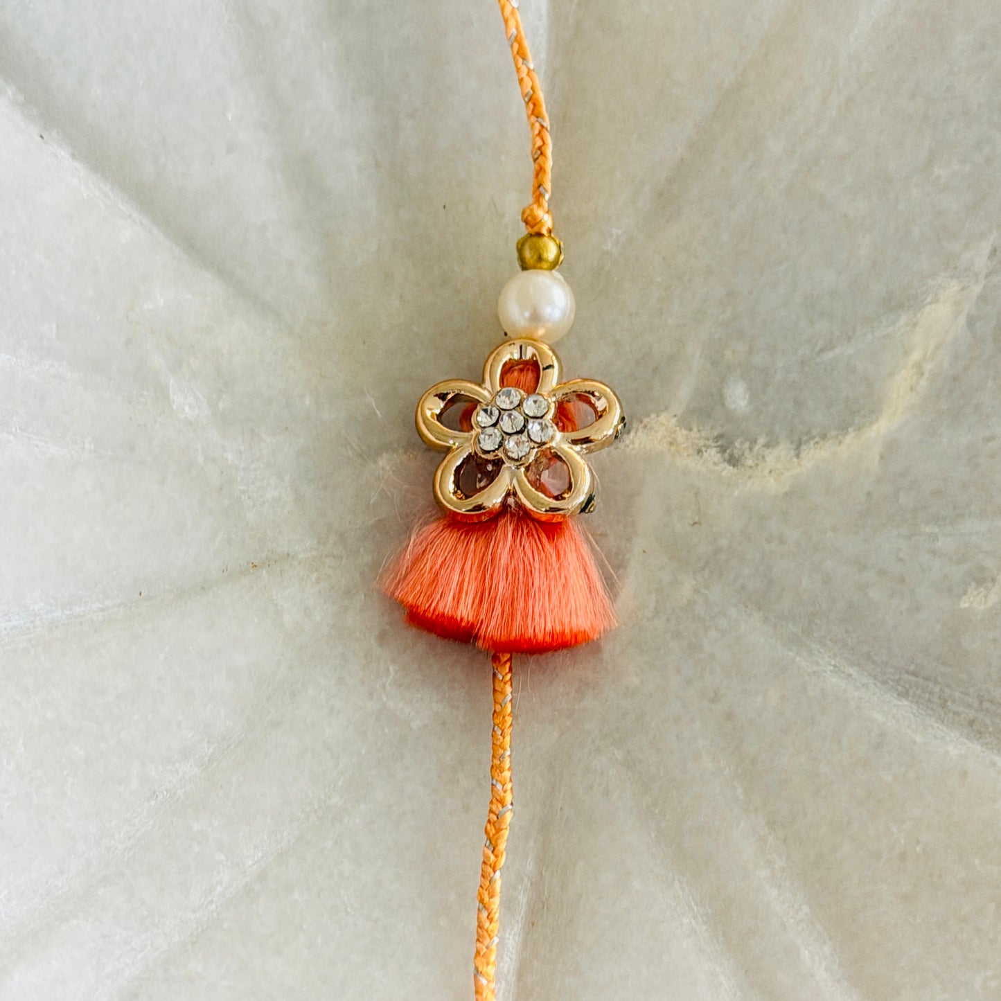 Golden Flower with Tassel Rakhi (Peach) - Single