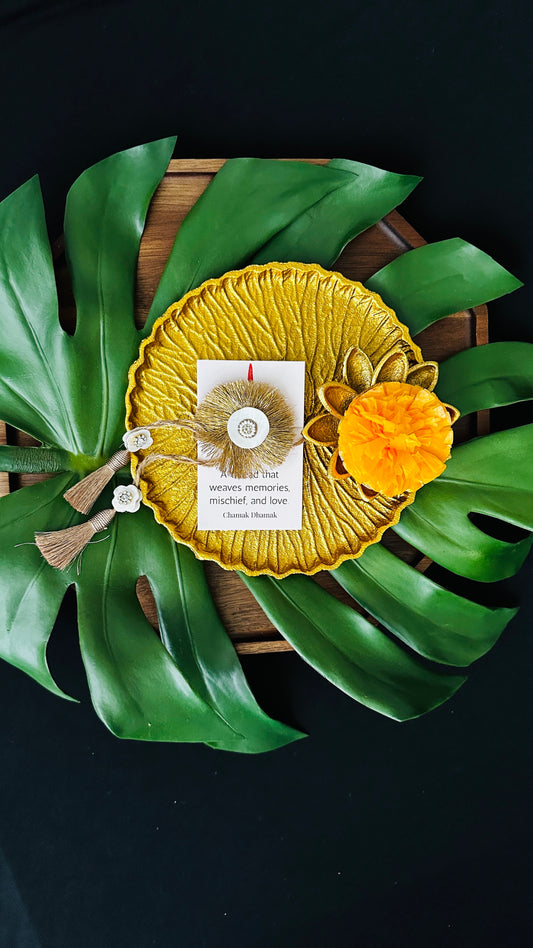 Golden Tissue and Shell Work Rakhi - Single