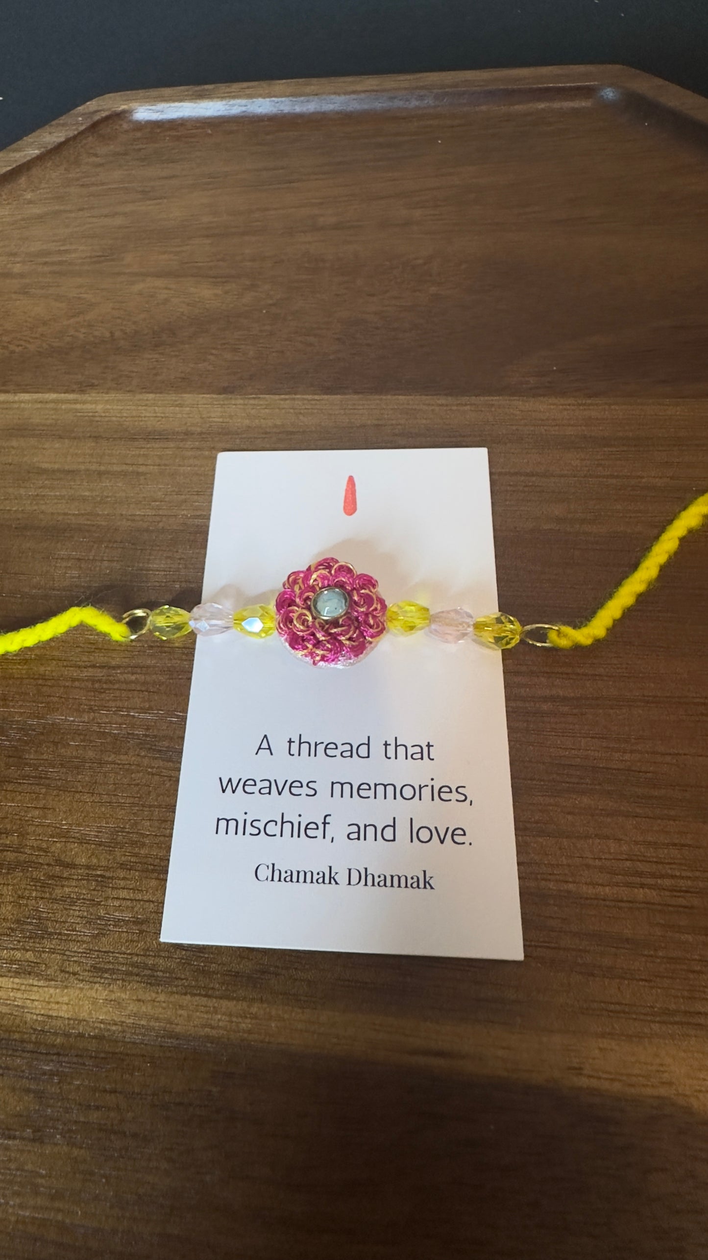 Handcrafted Circle Motif Rakhi – Green Thread with Leaf Accents