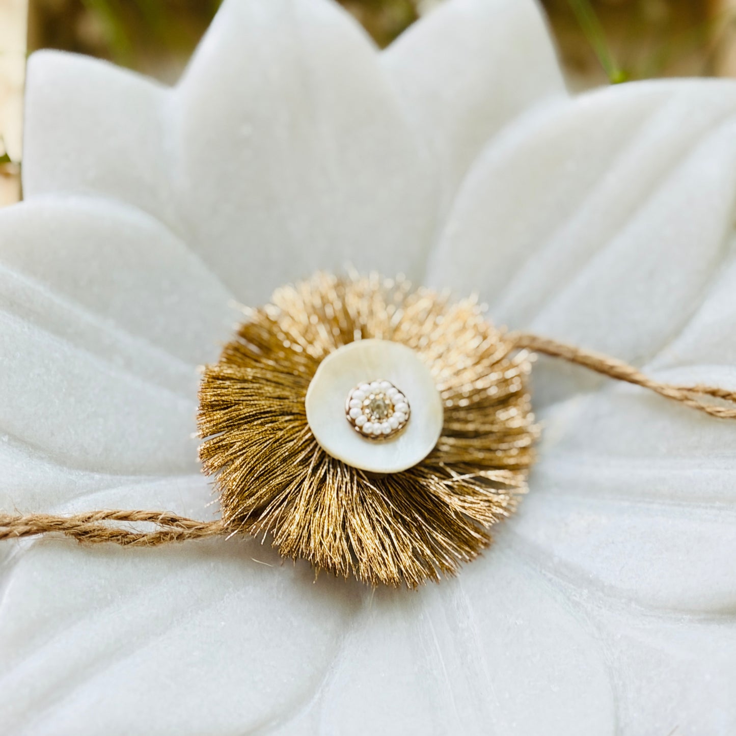 Golden Tissue and Shell Work Rakhi - Single