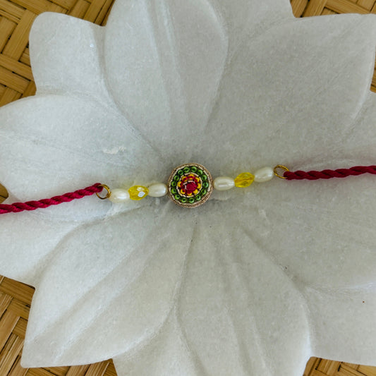 Embellished Rakhi with Pearl Beads – Pink Thread