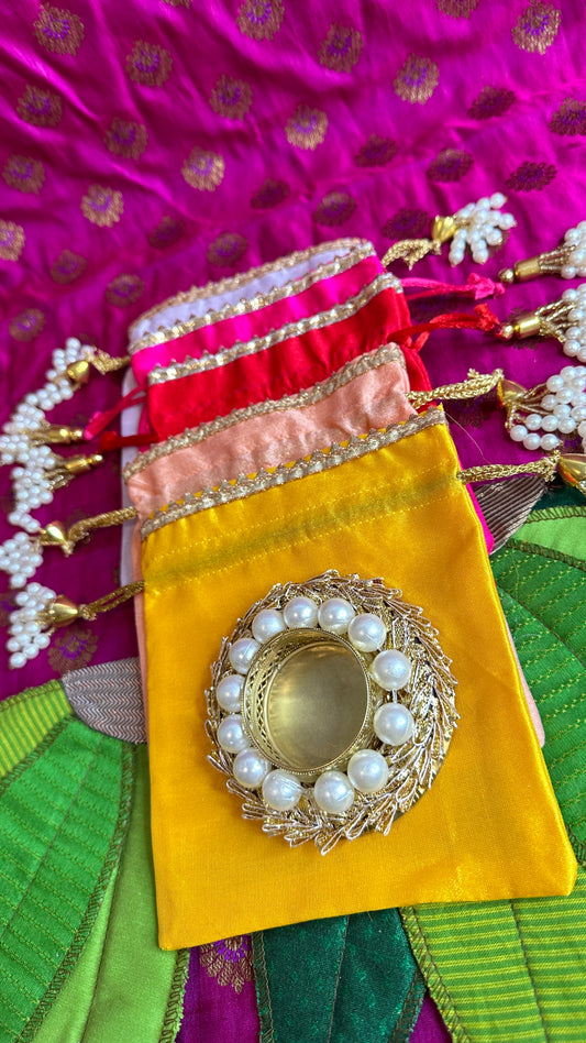 Vibrant Raw Silk Potli Bag with Gold Frill Diya