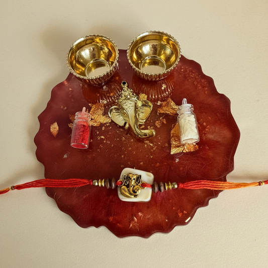 Golden Ganesha Resin Platter Rakhi Set