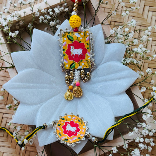 Yellow Pichwai Rakhi Set
