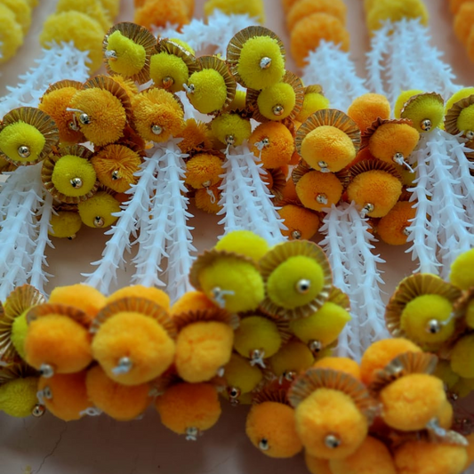 Festive 5ft Marigold Garland. adorned with flowets and pom-poms